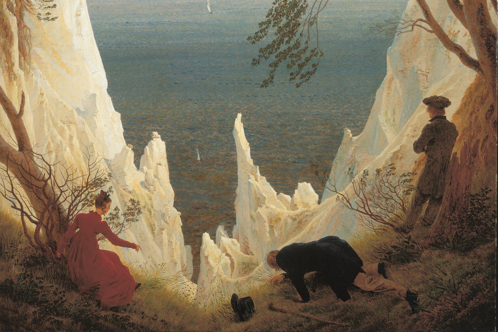 Gemälde mit drei Figuren im Vordergrund, eine Frau im roten Kleid und zwei Männer, einer davon stehend, einer knieend. Dahinter steil aufragende Kreidefelsen vor See-Hintergrund.